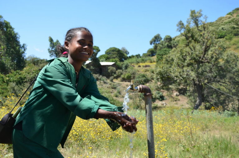 Asniko Azanaw while washing her hands after visiting the school latrine.JPG